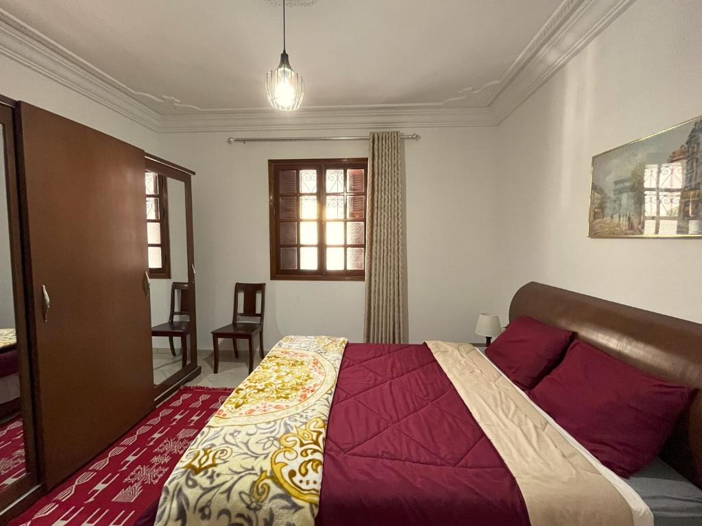 Postel nebo postele na pokoji v ubytování Maison d'hôtes DAR DRISS