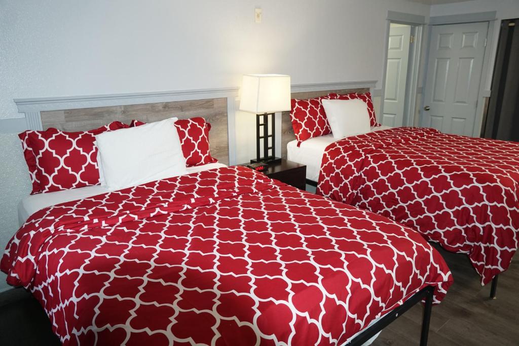 Postel nebo postele na pokoji v ubytování Best Motel