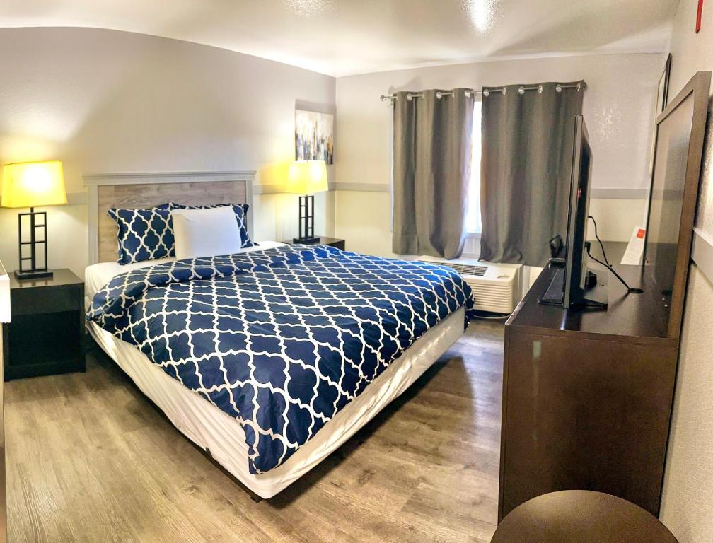 Postel nebo postele na pokoji v ubytování Best Motel