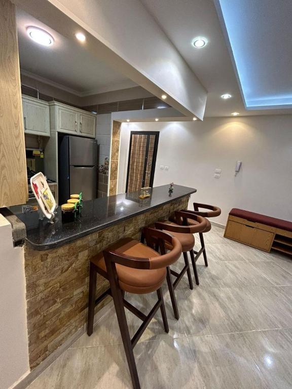 TV a/nebo společenská místnost v ubytování La Casa Chic retreat New cairo