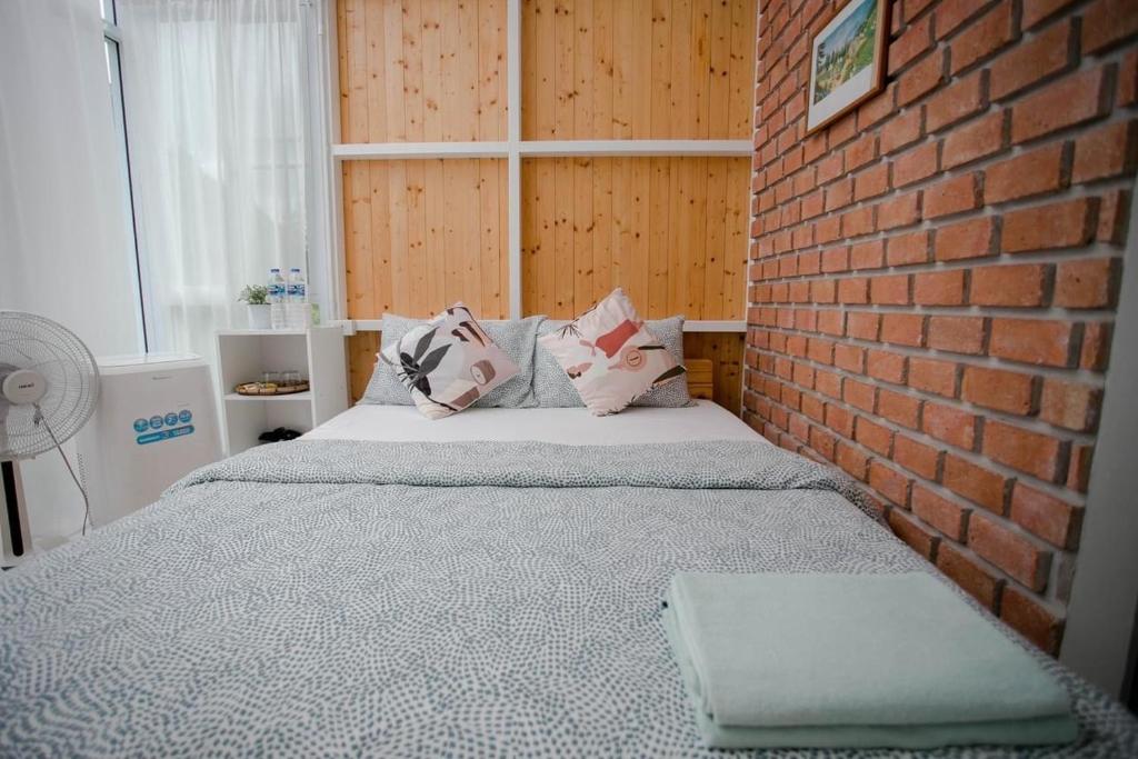 Postel nebo postele na pokoji v ubytování นอนนิ่ง อิงดาว