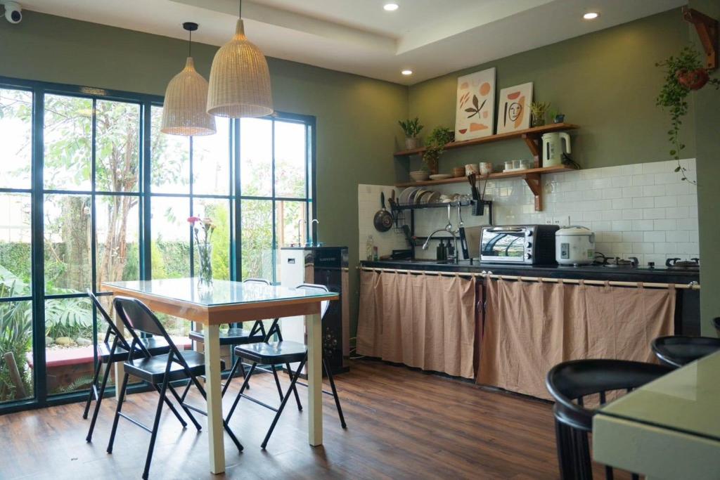 Kuchyň nebo kuchyňský kout v ubytování An Coffee House