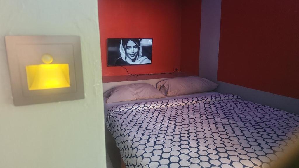 Postel nebo postele na pokoji v ubytování Entropy Apartment Hotel