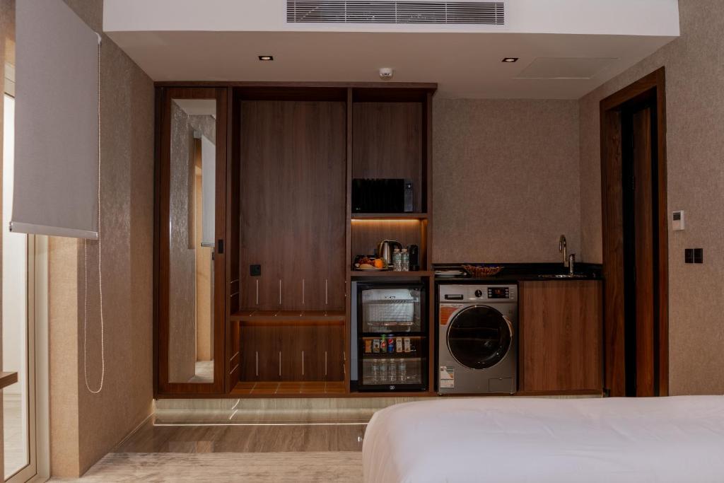 Postel nebo postele na pokoji v ubytování Damask Hotels