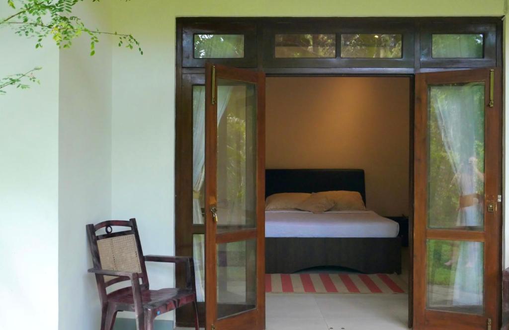 Postel nebo postele na pokoji v ubytování The Bliss Hostel Kandy
