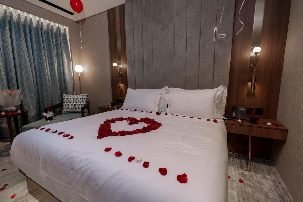 Postel nebo postele na pokoji v ubytování Damask Hotels
