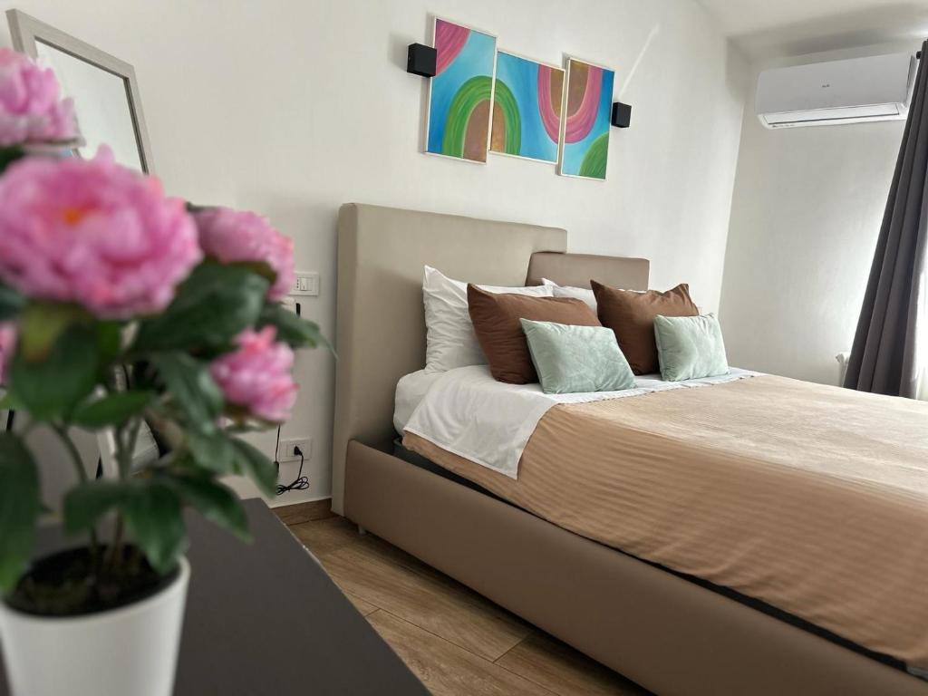 Łóżko lub łóżka w pokoju w obiekcie Zeta Rooms