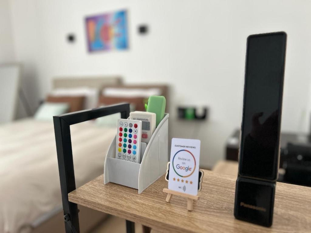 Łóżko lub łóżka w pokoju w obiekcie Zeta Rooms