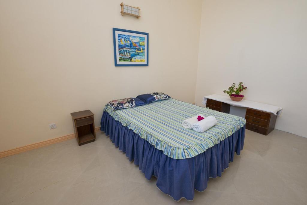 Postel nebo postele na pokoji v ubytování Le Refuge