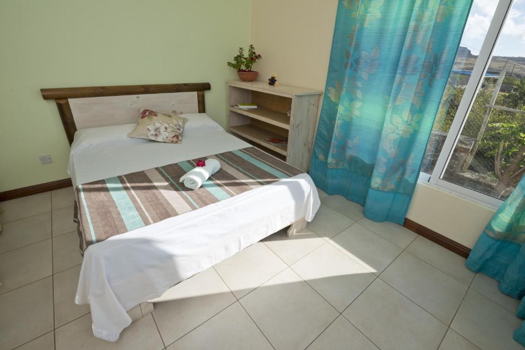 Postel nebo postele na pokoji v ubytování Le Refuge
