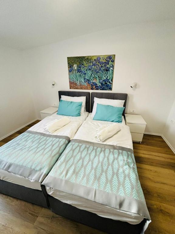 Postel nebo postele na pokoji v ubytování Hotel Pohorje
