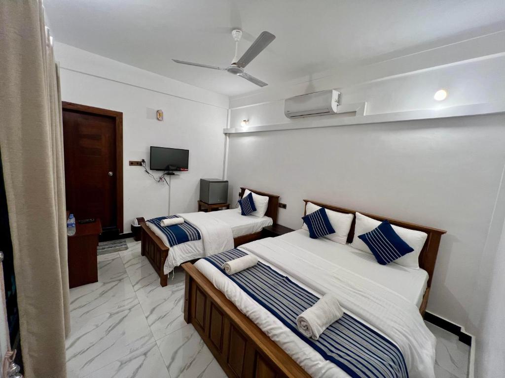 Jaffna Inn - Delüks Üç Kişilik Oda