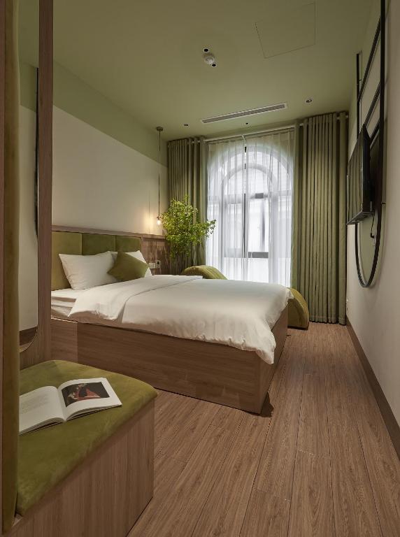 Postel nebo postele na pokoji v ubytování Hotel Ocean Homes
