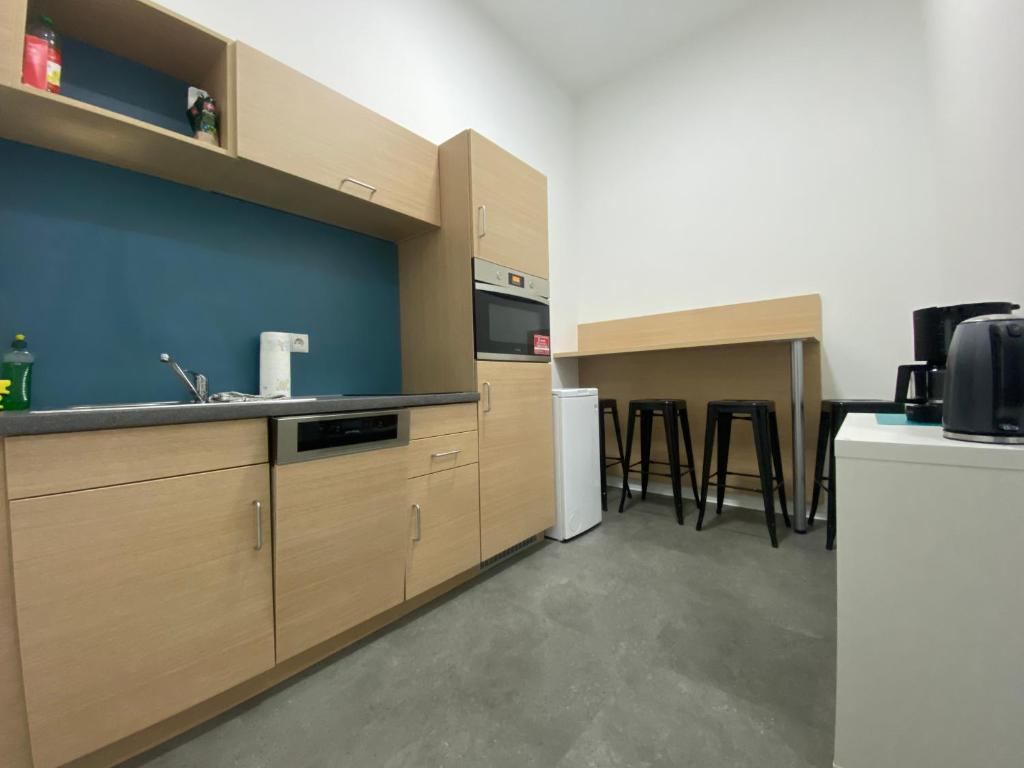 Kuchyň nebo kuchyňský kout v ubytování Fabella Flats Forchheim