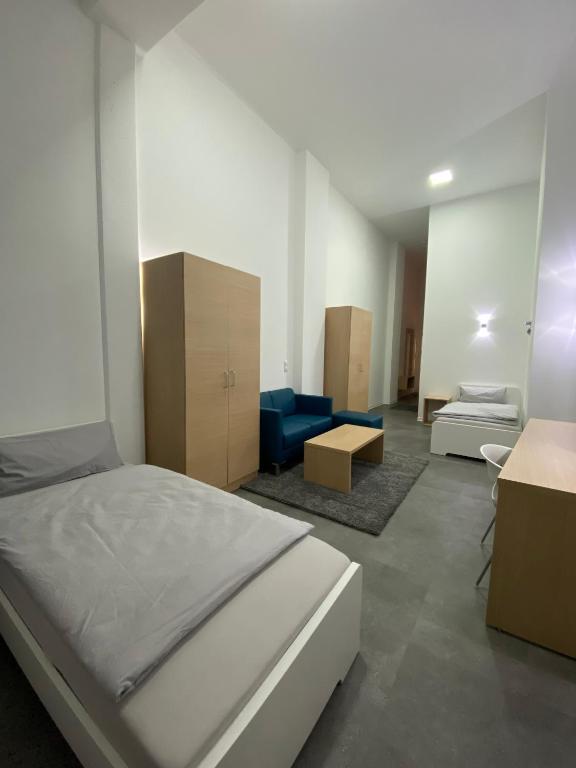 Postel nebo postele na pokoji v ubytování Fabella Flats Forchheim