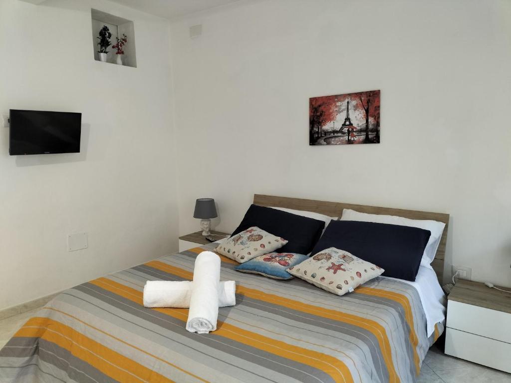 Säng eller sängar i ett rum på InCentro Palermo