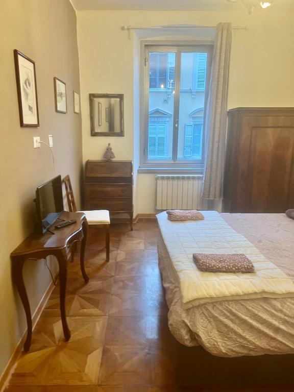 Posteľ alebo postele v izbe v ubytovaní Alla Scalinata del Teatro Rossetti parcheggio