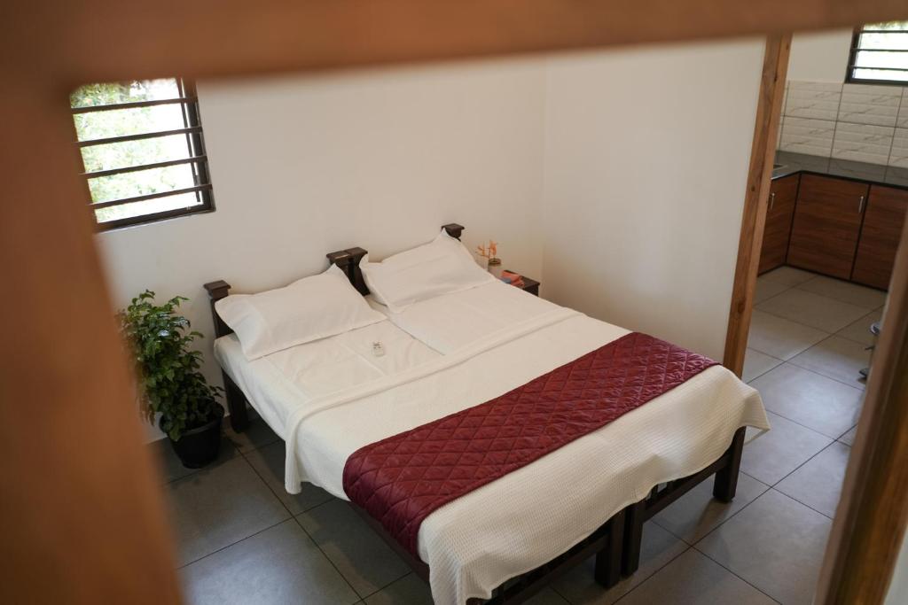 Postel nebo postele na pokoji v ubytování Marari Bobans villa