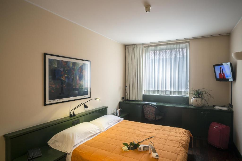 TV a/nebo společenská místnost v ubytování Hotel Del Riale