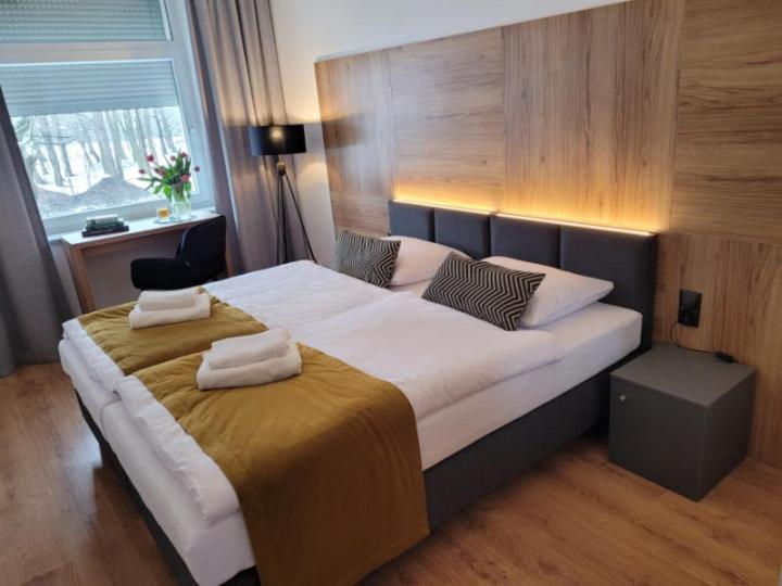 Posteľ alebo postele v izbe v ubytovaní Good Sleep