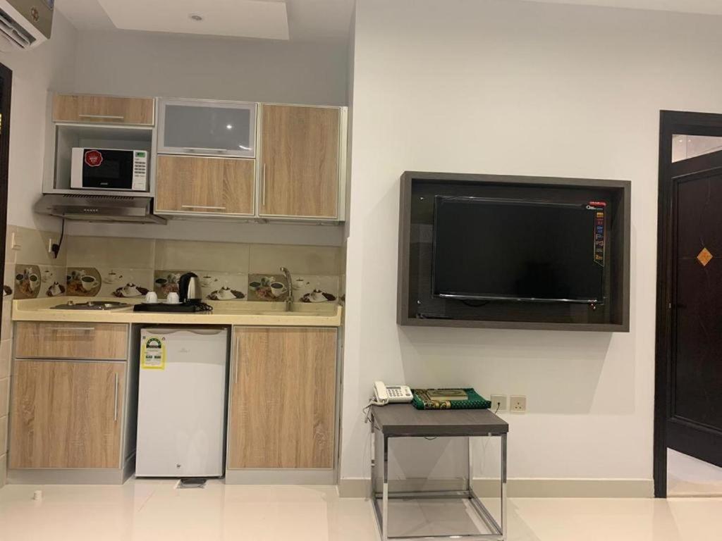 Kuchyň nebo kuchyňský kout v ubytování عماره هوليداي المروة- Holiday Al Marwa Building