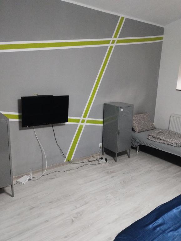 TV a/nebo společenská místnost v ubytování Hostel Antonia