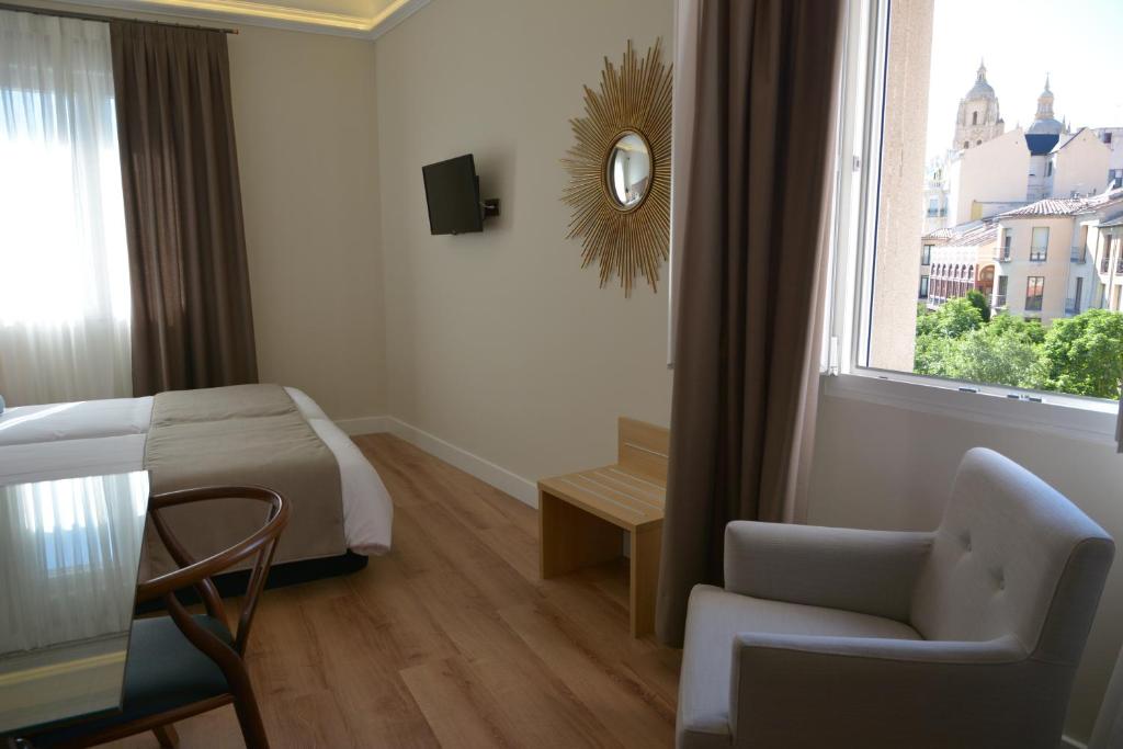 Posteľ alebo postele v izbe v ubytovaní Hotel Real Segovia by Recordis Hotels