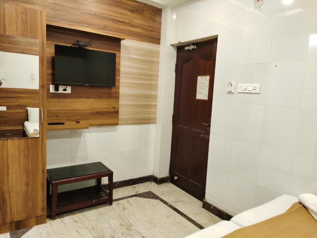TV a/nebo společenská místnost v ubytování Nile Guest House
