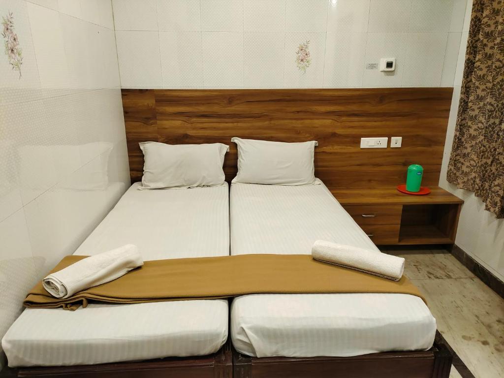 Postel nebo postele na pokoji v ubytování Nile Guest House