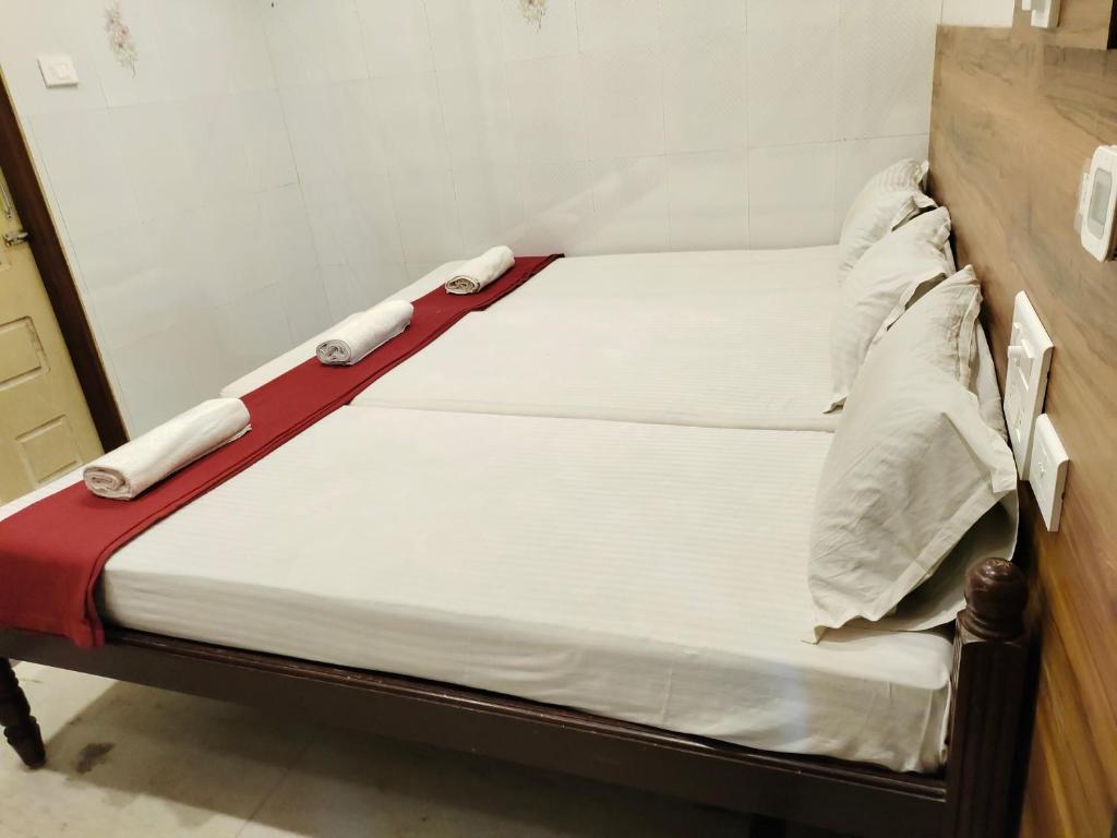 Postel nebo postele na pokoji v ubytování Nile Guest House