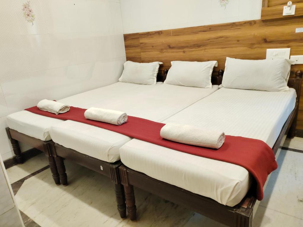 Postel nebo postele na pokoji v ubytování Nile Guest House