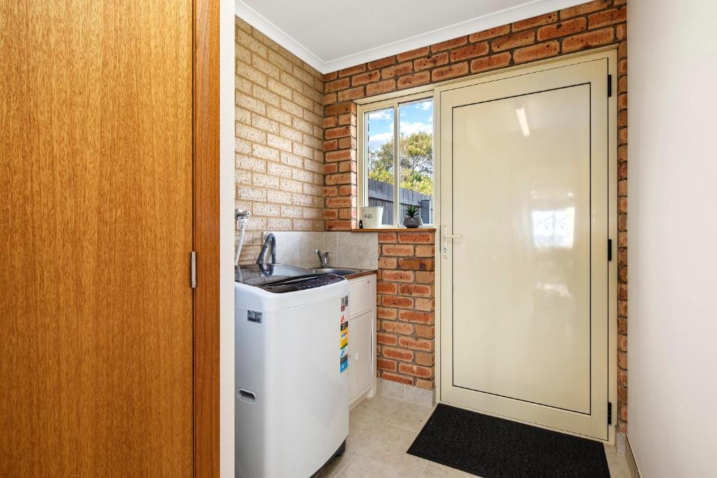Kuchyň nebo kuchyňský kout v ubytování Bicheno Spa Villa