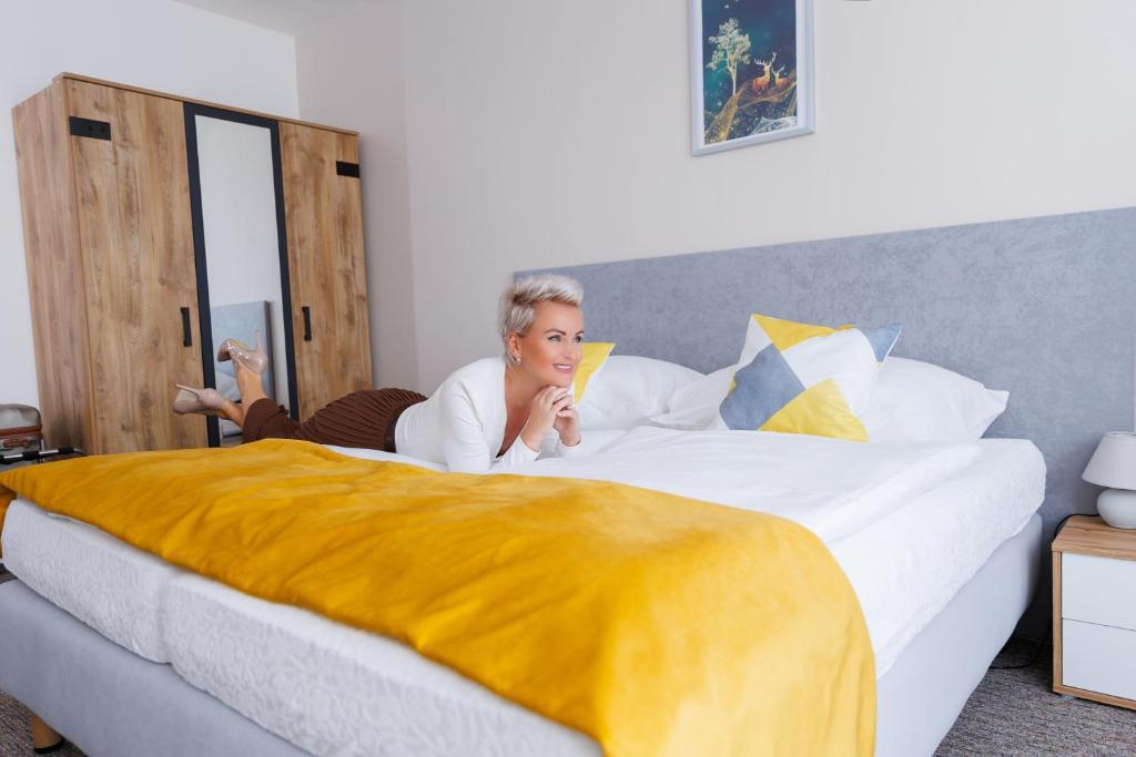 Postel nebo postele na pokoji v ubytování Hotel FIT