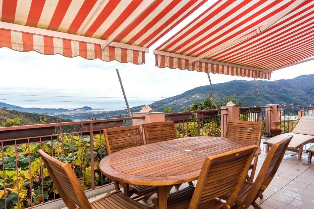 A balcony or terrace at SESTRI Villa Vignolo with POOL