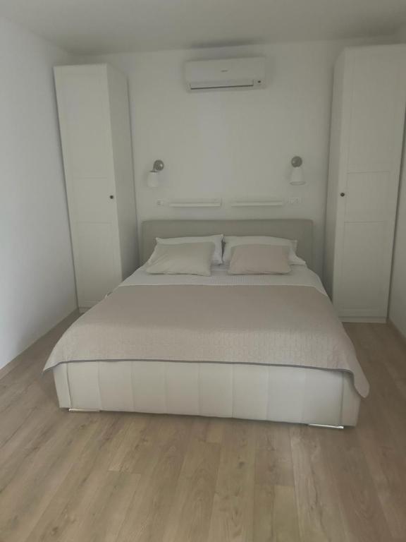 Posteľ alebo postele v izbe v ubytovaní Apartment Esperansa
