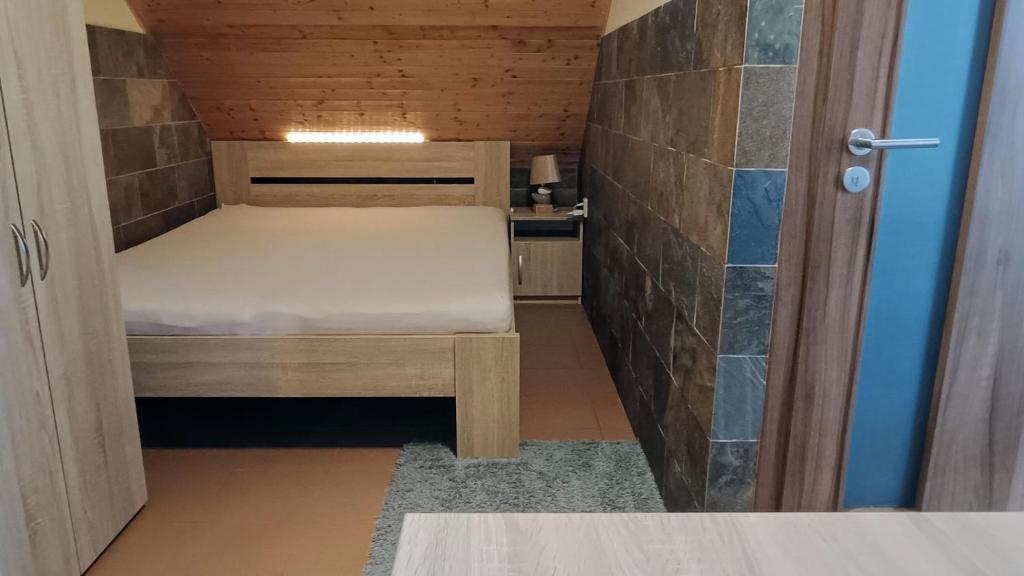 Кровать или кровати в номере Guest House Sherpa