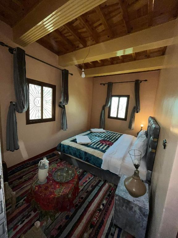 Postel nebo postele na pokoji v ubytování armed family lodge