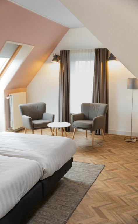 Posezení v ubytování Hotel In den Brouwery