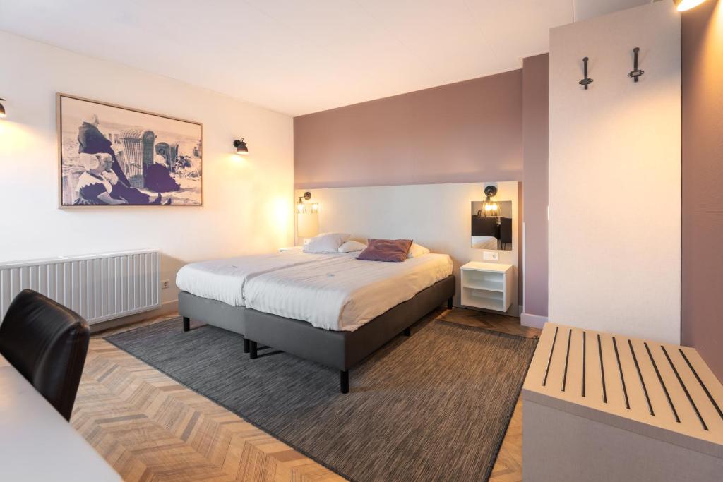 Postel nebo postele na pokoji v ubytování Hotel In den Brouwery