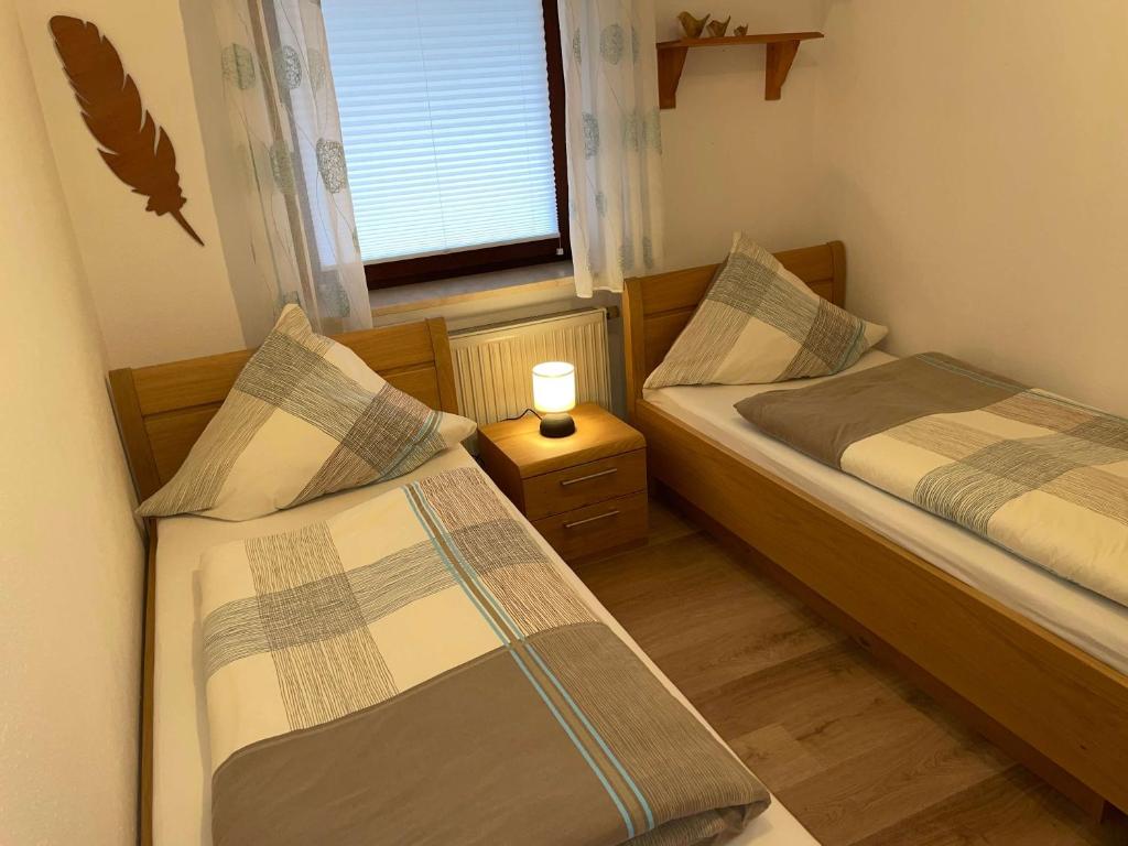 Postel nebo postele na pokoji v ubytování Einfach entspannen