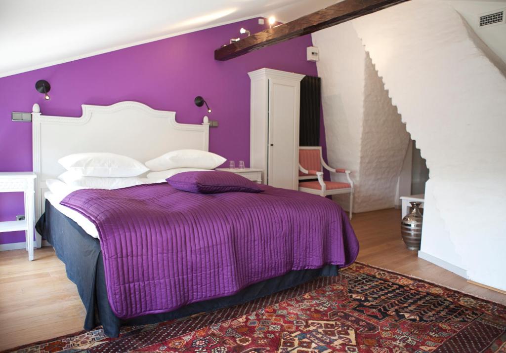 Postel nebo postele na pokoji v ubytování Hotel Hellstens Malmgård