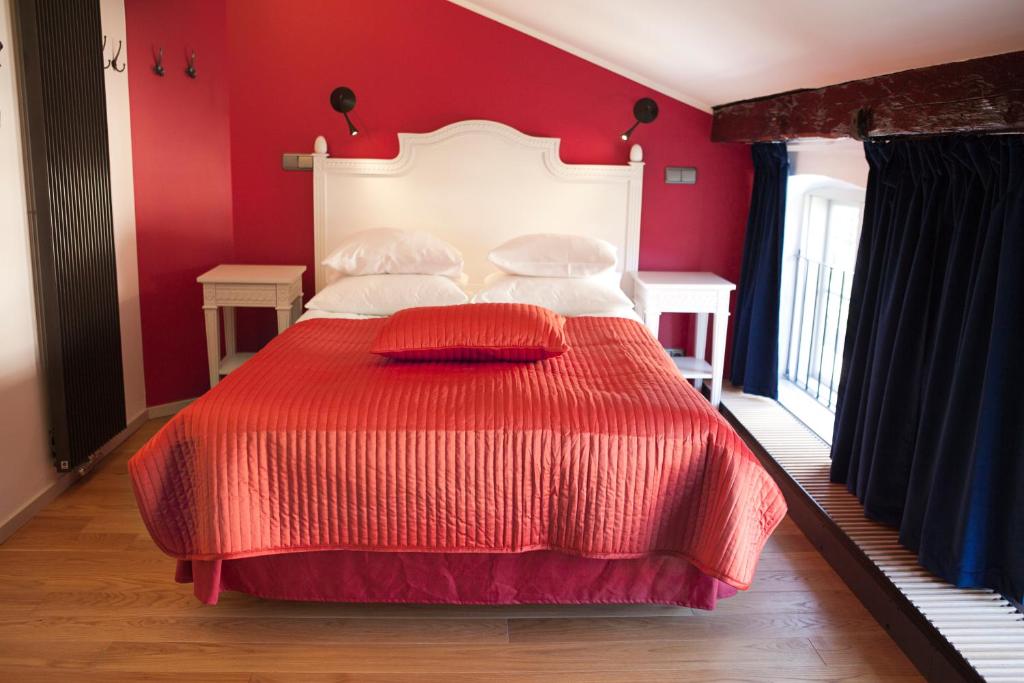 Postel nebo postele na pokoji v ubytování Hotel Hellstens Malmgård