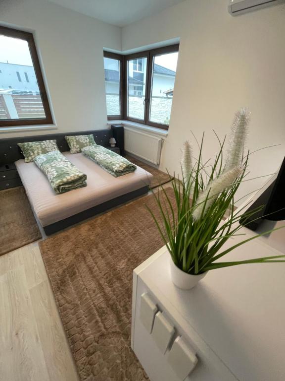 Postel nebo postele na pokoji v ubytování VRG 1 Exkluzív Apartman