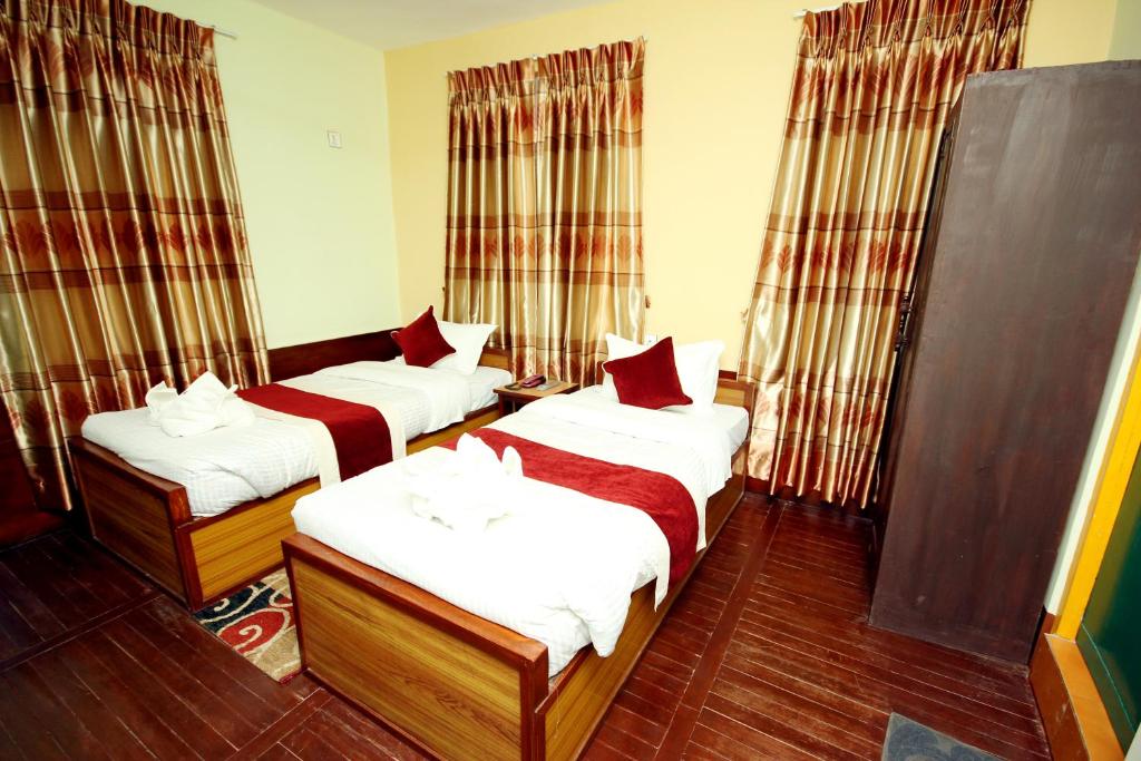 Postel nebo postele na pokoji v ubytování hotel Backpackers inn