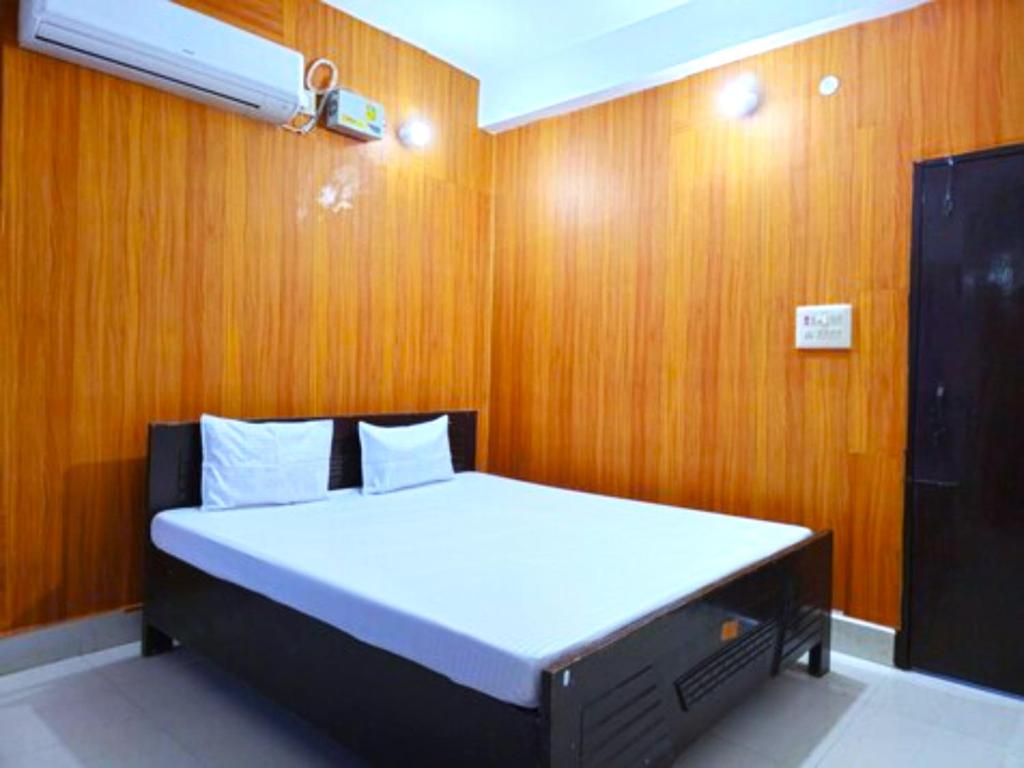 Voodi või voodid majutusasutuse GRG Nalanda Guest House toas
