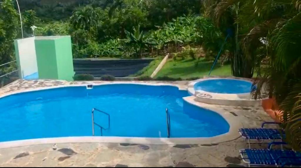 Bazén v ubytování Exclusiva casa de campo con Piscina nebo v jeho okolí