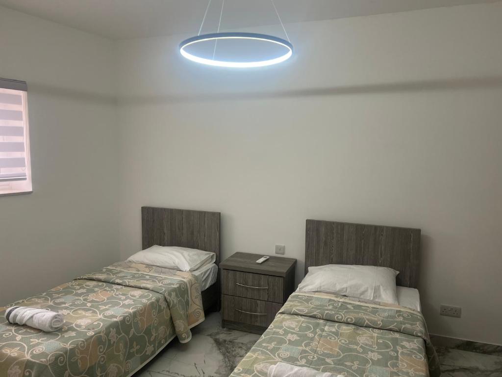Postel nebo postele na pokoji v ubytování Maisonette 2