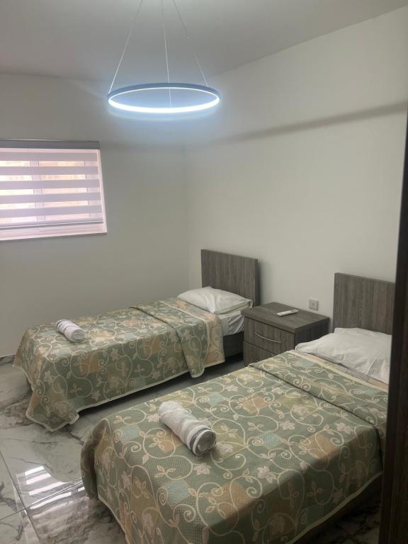Postel nebo postele na pokoji v ubytování Maisonette 2