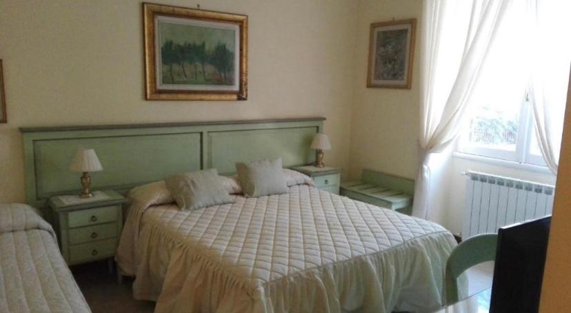 Postel nebo postele na pokoji v ubytování Villa Orsini