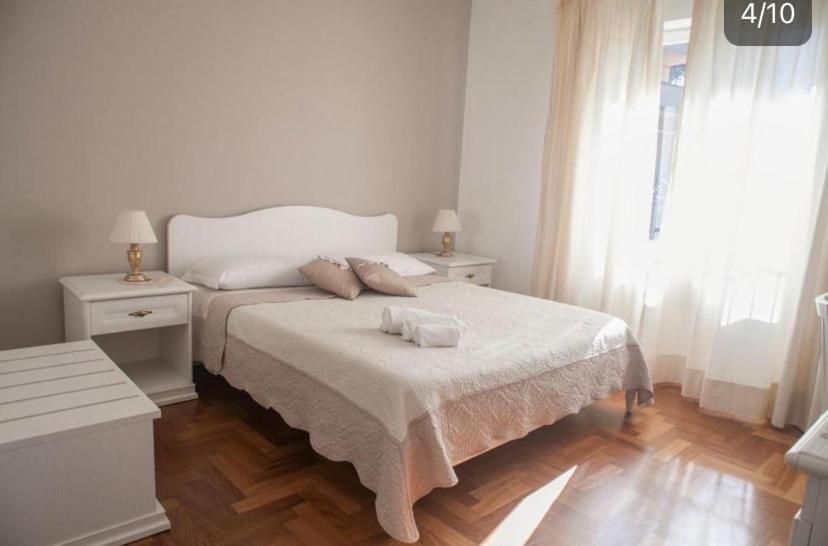 Postel nebo postele na pokoji v ubytování Villa Orsini